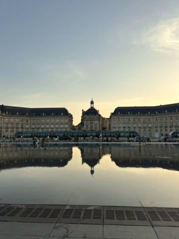 A Bordeaux tram passing the Miroir d'eau on the quays
