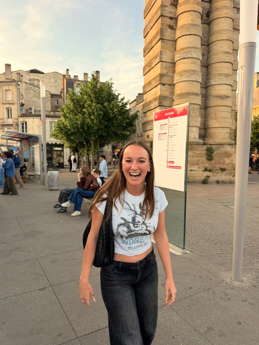 Freya laughing at Place de la Victoire in Bordeaux